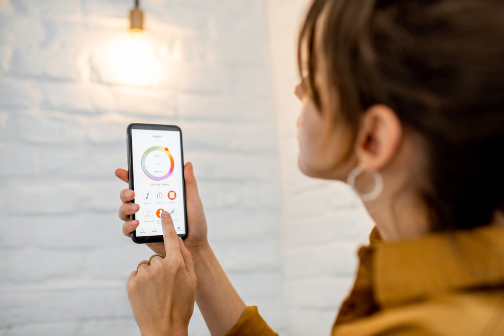 Woman using smart home technology